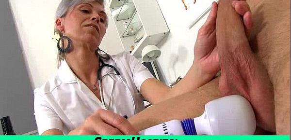  Sexy uniform milf Beate milking young male patient
